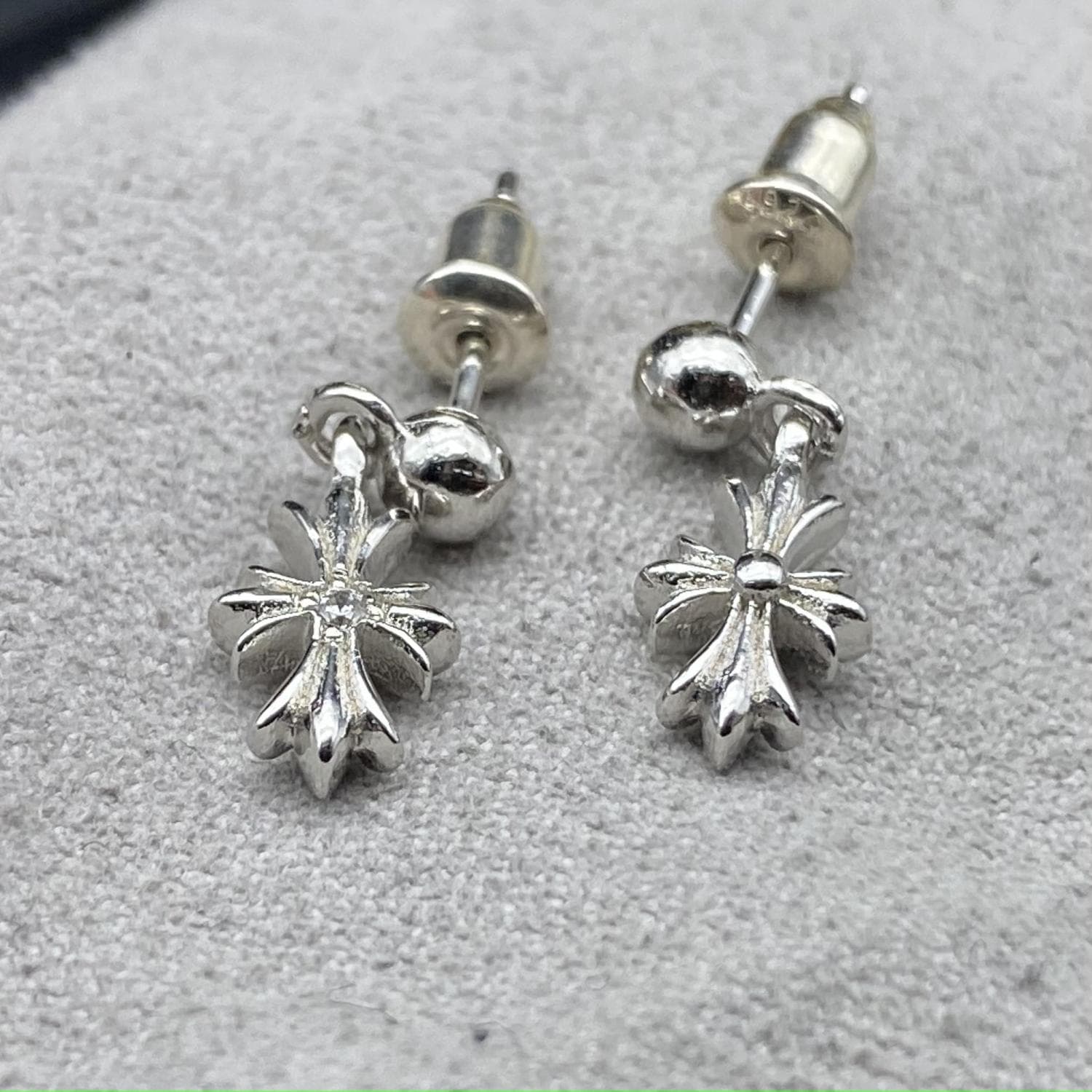 Platinum plated small cross earrings — view 1
